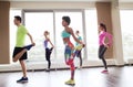 Group of smiling people exercising in gym Royalty Free Stock Photo