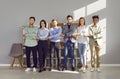 Group smiling people standing in row holding hands in office Royalty Free Stock Photo