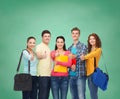 Group of smiling teenagers showing thumbs up Royalty Free Stock Photo