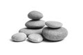 Group of smooth grey stones. Sea pebble. Stacked pebbles isolated on white background Royalty Free Stock Photo