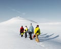 Group of snowboarders enjoying a beautiful Winter morning Concep Royalty Free Stock Photo