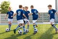 Group of Soccer Team Players on Training Session with Coach Royalty Free Stock Photo