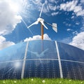 Group of Solar Panels and a Small Wind Turbine - Renewable Energy Concept Royalty Free Stock Photo