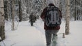 Group of soldiers run on skis in the woods with weapons. Clip. Soldiers with AK-47 rifles and grenade launchers running Royalty Free Stock Photo