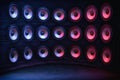 Group of sound speakers in neon light. Royalty Free Stock Photo