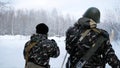 Group of special forces weapons in cold forest. Clip. Soldiers on exercises in the forest in the winter. Winter warfare