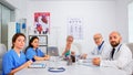 Group of specialist doctors having video meeting Royalty Free Stock Photo