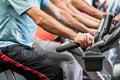 Group spinning at the gym on fitness bikes Royalty Free Stock Photo