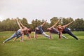 Group sport fitness exercise outdoor in the park.