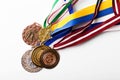 Group of sport medals on white background