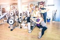 Group of sportive young women taking selfie with mobile smart phone at gym fitness club - Happy sporty people in weight room Royalty Free Stock Photo