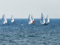 A group of sportsmans on small sailing yachts trains on the Mediterranean Sea near the coast of Nahariyya in Israel
