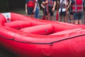 Group of sportsmen in wetsuits with paddles in helmets and life jackets vest prepare to extreme water sports, team before rafting