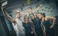 Group of sporty people in sportswear taking selfie photo at gym. Royalty Free Stock Photo