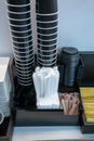 Group of Stack coffee black paper cup, space to put logo, life cafe background