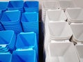 Group of Stacked White and Blue Plastic Containers for Sale