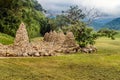 Group of stone cairns at edge of field near treeline in public park Royalty Free Stock Photo