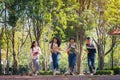 Group of student happy young people running outdoors, Diverse Young Students Book Outdoors Concept Royalty Free Stock Photo