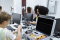 Group of student learning to repair electrical appliances. education on table at class room, Robotics learning innovation. Royalty Free Stock Photo