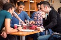 Group of student socializing after class Royalty Free Stock Photo