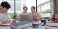Group of Student Study Together in a Modern Library with Laptops and Books Royalty Free Stock Photo