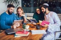 Group of students of diverse ethnic learning at home. Learning and preparing for university exam Royalty Free Stock Photo