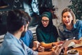 Students of diverse ethnic learning at home. Learning and preparing for university exam, selective focus Royalty Free Stock Photo