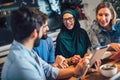 Students of diverse ethnic learning at home. Learning and preparing for university exam Royalty Free Stock Photo