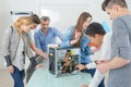 Group students fixing computer during it class Royalty Free Stock Photo