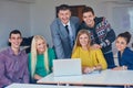 Group of students getting suppport from teacher Royalty Free Stock Photo