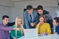 Group of students getting suppport from teacher Royalty Free Stock Photo