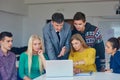 Group of students getting suppport from teacher Royalty Free Stock Photo