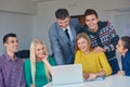 Group of students getting suppport from teacher Royalty Free Stock Photo