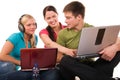 Group of students having fun, doing home work Royalty Free Stock Photo