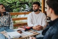 Group of students engaging in outdoor study session Royalty Free Stock Photo