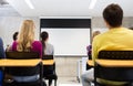 Group of students in lecture hall Royalty Free Stock Photo