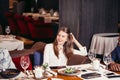 Group of students meeting in restaurant at dinner