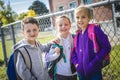 Students outside school standing together Royalty Free Stock Photo