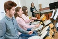 Group students playing in school orchestra together Royalty Free Stock Photo