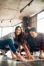 Group of students playing twister game