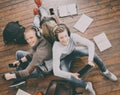 Group of students reading books, and studyin on the floor Royalty Free Stock Photo