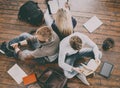 Group of students reading books, and studyin on the floor Royalty Free Stock Photo