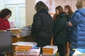 A group of students return books to the College library Royalty Free Stock Photo