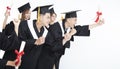 Group of Students Running and Celebrating Graduation Royalty Free Stock Photo