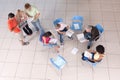 Group of students sitting down with lecturer