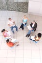 Group of students sitting down with lecturer