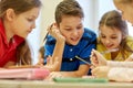 Group of students talking and writing at school Royalty Free Stock Photo