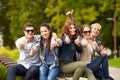 Group of students or teenagers showing thumbs up