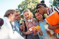 Group of students texting their groupmates together. Royalty Free Stock Photo