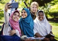 Group of students using mobile phone